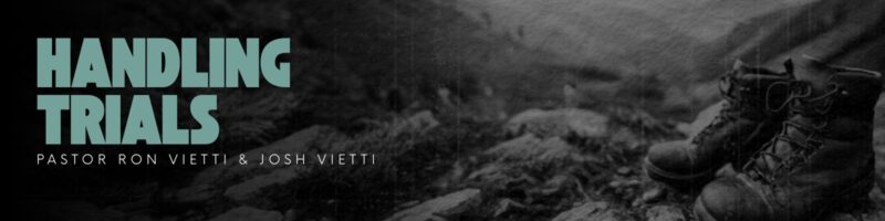 Worn boots beside stream, "Handling Trials" banner